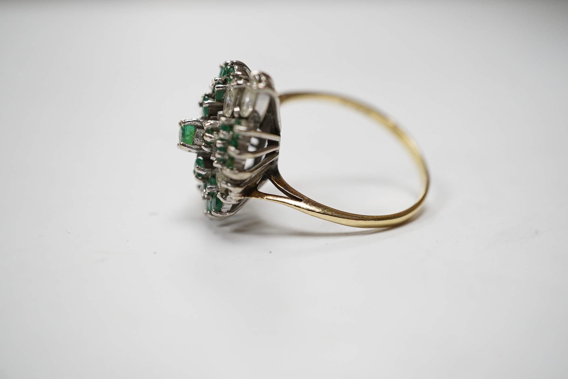 A modern 14ct gold, marquise cut diamond and round cut emerald cluster ring, size P/Q, gross weight 5.5 grams. Condition - poor to fair.